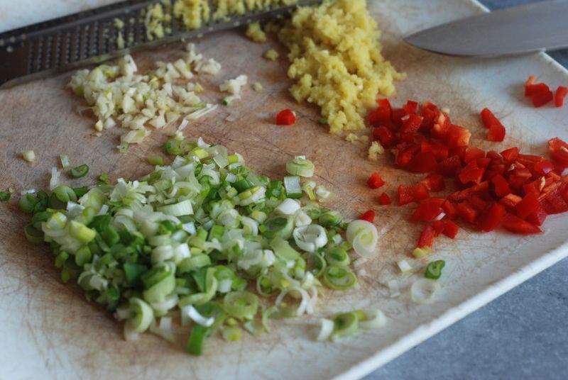 Chopped ginger, scallions, chile and garlic Chopped ginger, scallions, chile and garlic