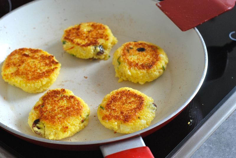 Frying couscous cakes Frying couscous cakes