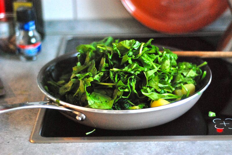 Sauteeing fresh spinach Sauteeing fresh spinach