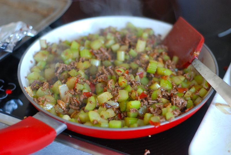 Stirfrying celery and beef Stirfrying celery and beef